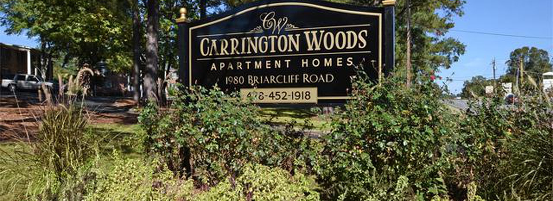 Carrington Woods Apartments sign